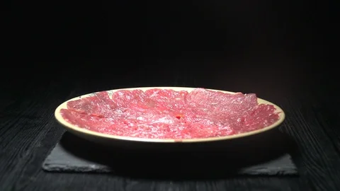 Dripping Red Pepper on Tender Beef Stock Footage 111637965