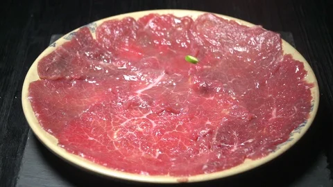 Dripping Red Pepper on Tender Beef Stock Footage 111638459