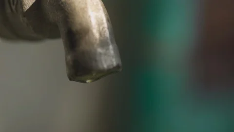 Dripping water from the tap Stock Footage 128176773