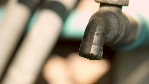 Dripping water from the tap. Stock Footage 128176802