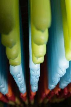 Dripping wax of candles in range of colors and selective focus around mid poi Stock Illustration