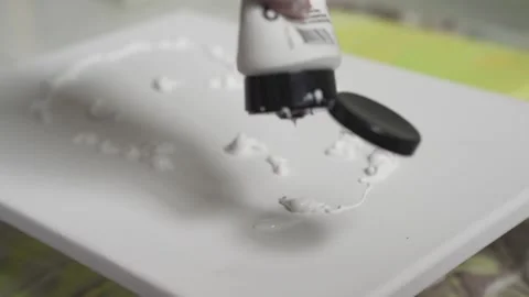 Dripping White Paint on Canvas Stock Footage 139265198
