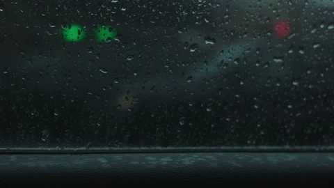 Drive by as car window rolls down to show dreary downtown street Vídeos de archivo 251216799