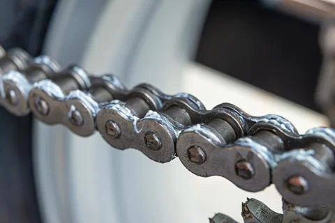 Drive chain of a motorcycle Stock Photos