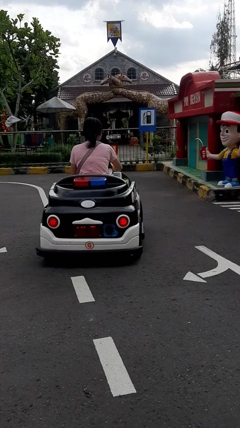Drive a children's car Stock Footage 231541308