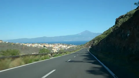 Drive down La Gomera to the capital city San Sebastian Stock Footage 229950995