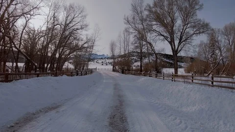 Drive down a Winter Road with snow near Ridgway Colorado and San Juan Mountains Stock Footage 118245781