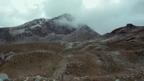 Drive on a mountain pass at winter side view tracking Stock Footage 81889633