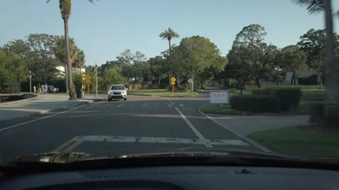 Drive Plate brick stree Front windshield in early sunny day on Coffee Pot Blvd Stock Footage 250652914