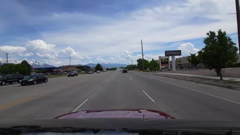 Drive Plate-Forward view 6 lane road thru commercial area Stock Footage 243057858