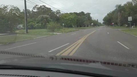 Drive Plate front window in for lane road sunny day and red light. Stock Footage 249607424