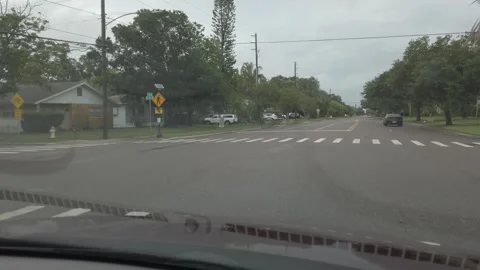 Drive Plate front window in for lane road sunny day and red light. Stock Footage 249607716