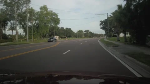 Drive Plate from Front windshield on a sunny day in Gulfport, Florida. Stock Footage 249209305