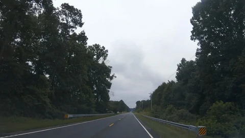 Drive Plate-Long straight 2 lane Long Creek Highway through rural South Carolina Stock Footage 111852014