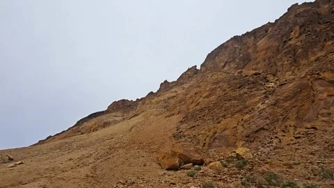 Drive Plate-Passing rugged rust colored mountain in Death Valley Stock Footage 264941353