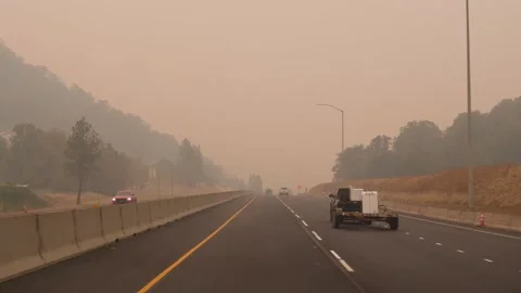 Drive Plate-POV-Interstate 5 in Oregon thick smoke from wild fires Stock Footage 140701435