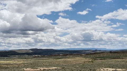 Drive Plate-POV-Side view rolling sagebrush hills western Colorado clouds Stock Footage 76506331