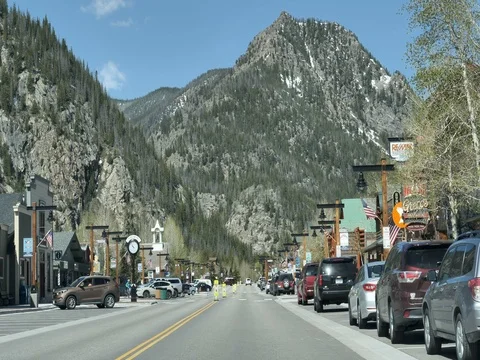 Drive Plate-POV-View forward-Historic Frisco Colorado toward mountain Stock Footage 76946400