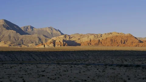Drive Plate-Rock formations at Red Rock Canyon at sundown-Side view Stock Footage 117400660
