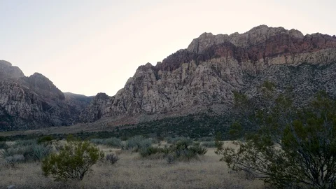 Drive Plate-Rugged Spring Mountains in the shade at sundown west of Las Vegas Stock Footage 117400060