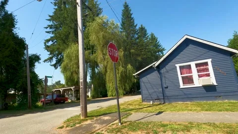 Drive Plate-Side view driving residential neighborhood in Snoqualmie, Washington Stock Footage 211782468