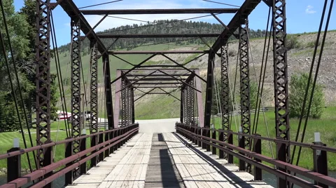 Drive POV historic Hutchins Bridge Madison River Montana HD Stock Footage 59337551