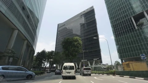 Drive by QUE Bayfront and The Arcade on Collyer Quay. Singapore Video stock 71261872