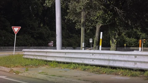Drive by of on ramp Fixed 1080p 30fp Stock Footage 90098041
