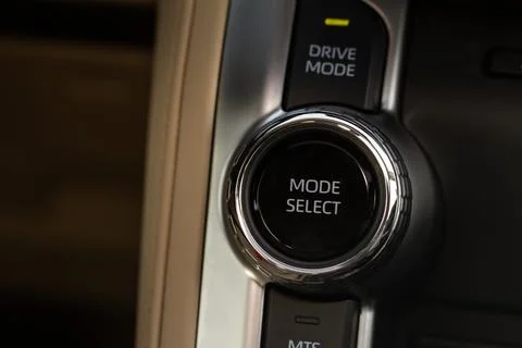 Drive selector button. Car interior, offroad drive controller closeup view. W 스톡 사진