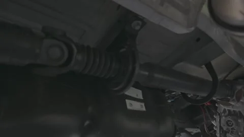 Drive shaft of a 4x4 van moving toward the transfer case, transmission Stock Footage 245777086