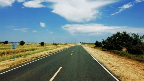 Drive straight ahead TX old highway Stock Footage 114989559