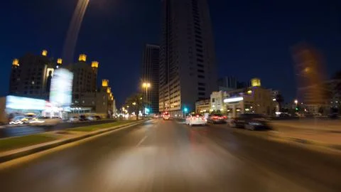 Drive on the streets of Ajman timelapse hyperlapse at night time with lights. Foto stock