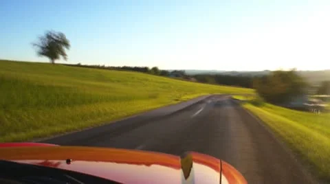 Drive through Landscape with Sunset Stock Footage 10680012