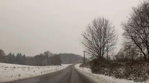 Drive through snowfall in the mountains Stock Footage 20522882