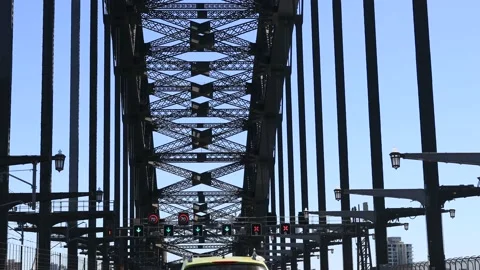 Drive through Sydney Harbour Bridge – steel arch and blue sky in 4k. Stock Footage 146711194