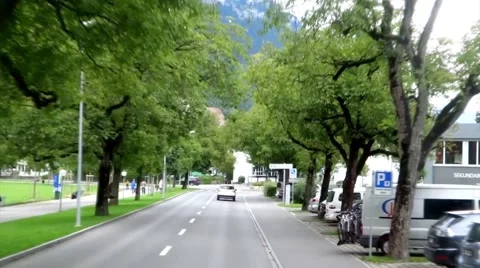 Drive in through trees in Interlake City Switzerland Stock Footage 66054506