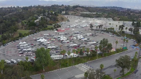 Drive Through Vaccination Site at Dodger Stadium Los Angeles California Drone Stock Footage 335299380