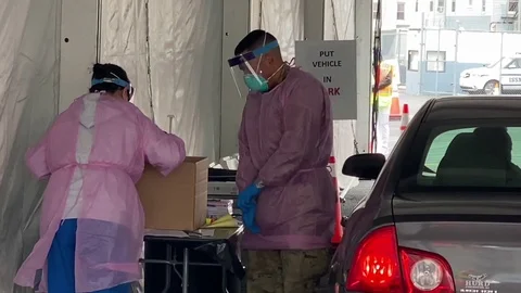 Drive-Thru COVID-19 Testing Stock Footage 128973879