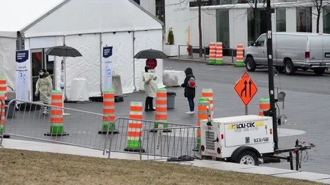 Drive thru Covid-19 testing station in downtown Montreal Stock Footage 131177599