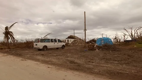 Drive-By View of Hurricane Dorian Aftermath Across Grand Bahama Settlements Stock Footage 118205312