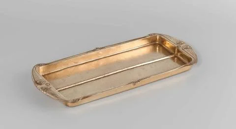 . The driven bin of copper has a rectangular shape with a low wall, which ... Stock Photos