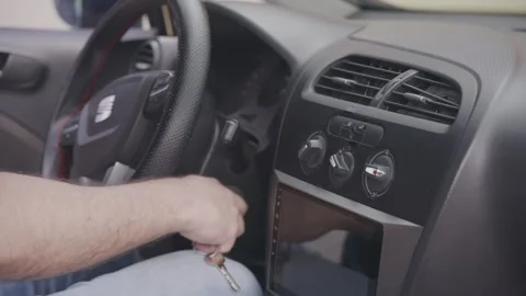 Driver adjusts car dashboard Vídeo Stock 331125632