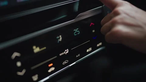 The driver adjusts the climate control system. Car air blowing mode Air  Stock Footage 264105388
