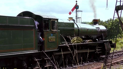Driver and coal flames steam engine Bradley Manor Stock Footage 80320801