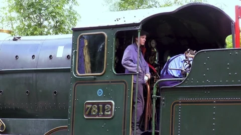 Driver and fireman Working vintage steam train Stock Footage 80292000