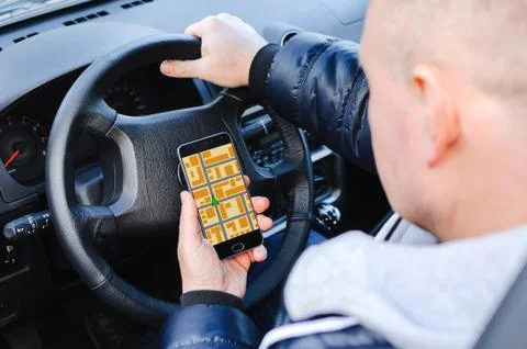 The driver and gps Stock Photos