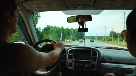 Driver and a passenger in a car Vídeo Stock 53310953