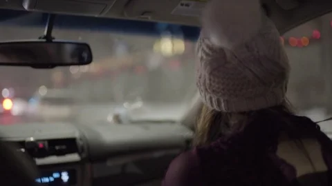 Driver And Passenger Sing And Dance To Music In Moving Car In City At Night Stock Footage 73255746