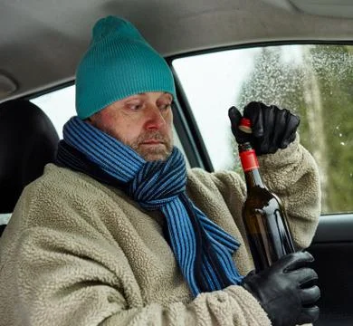 Driver and wine bottle Stockfoto's