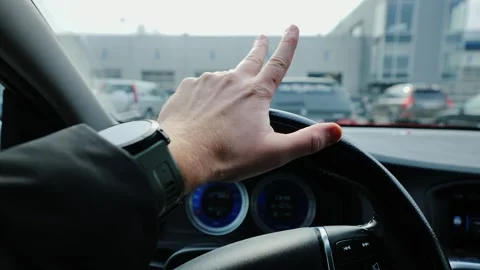 Driver Anxiously Checking Time - Stressed Waiting in Car Inspection Queue, 4K Stock Footage 308464591